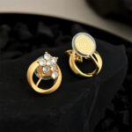 Mobius ~ Original gold-plated zircon earrings in a geometric, minimalist, and luxurious design. A stylish accessory for women. - Image 4